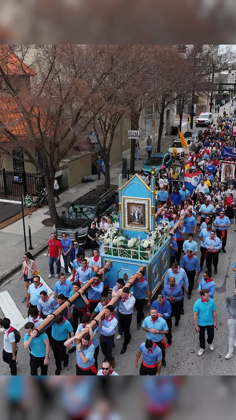 Overhead view of the March for Life procession carrying the restored processional vada